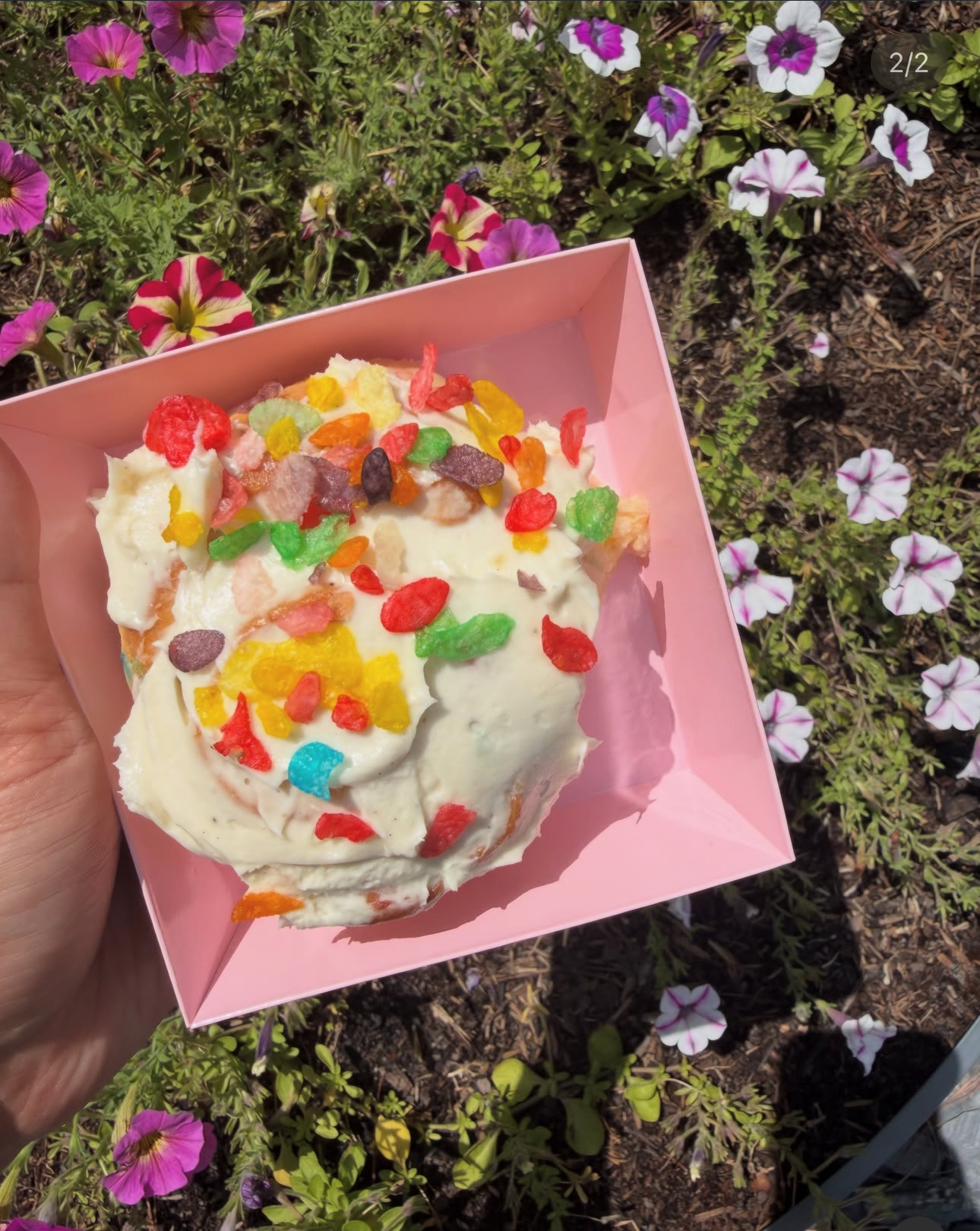 Fruity Pebbles frosted cinnamon roll